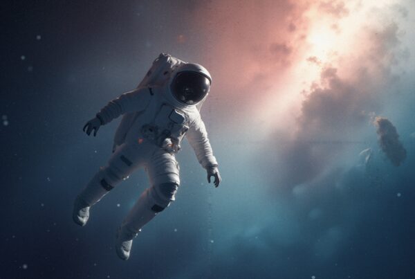 Astronaut floating in deep space amidst cosmic wonders.