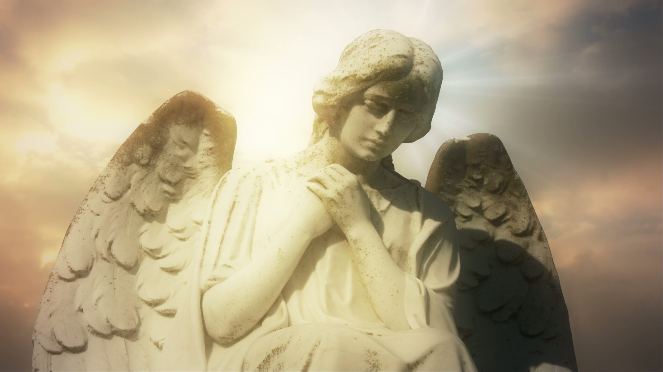 Angel Statue in Golden Light 4K Video Loop