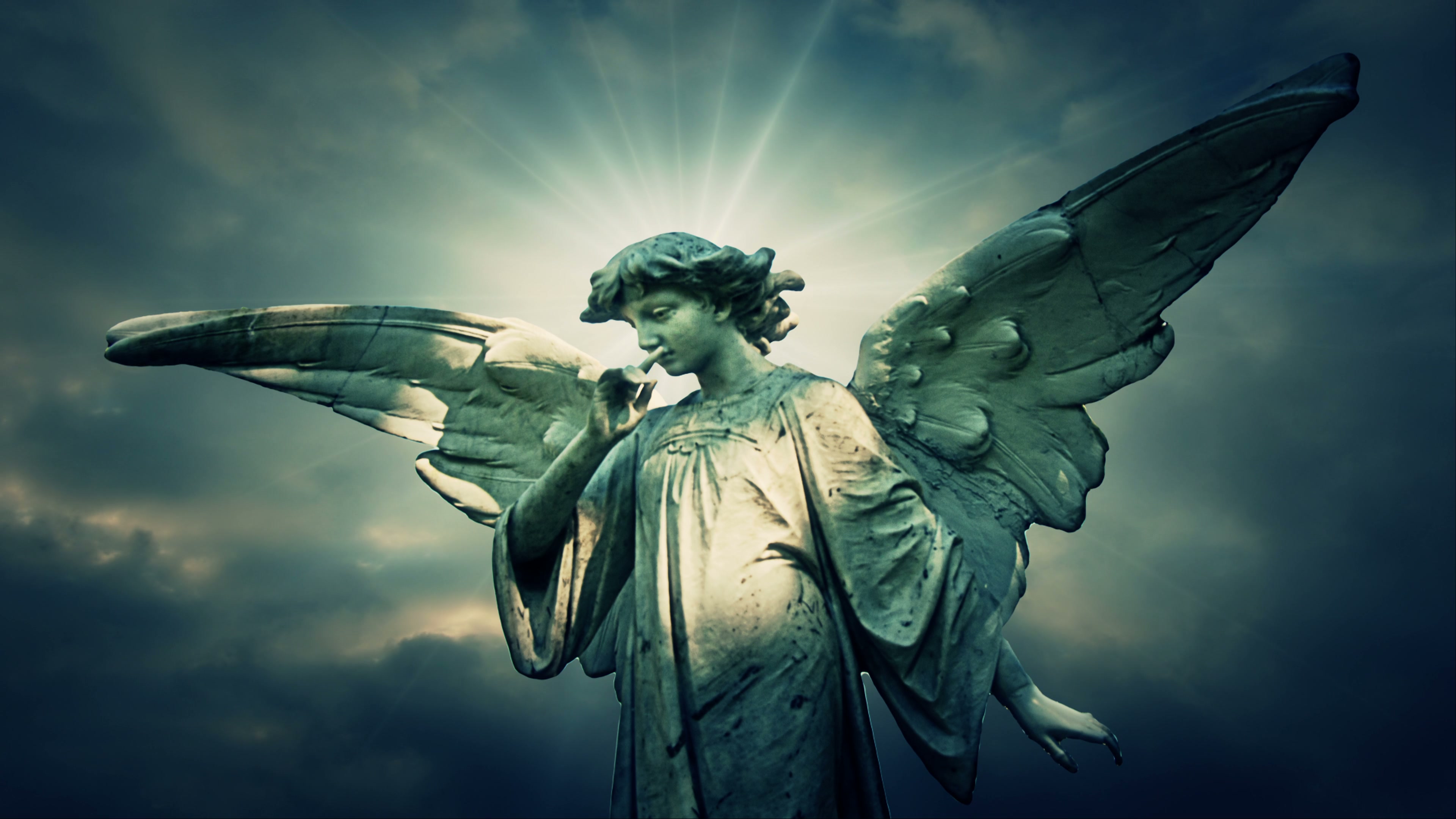 Angel Against Radiant Time-Lapse Sky 4K Loop