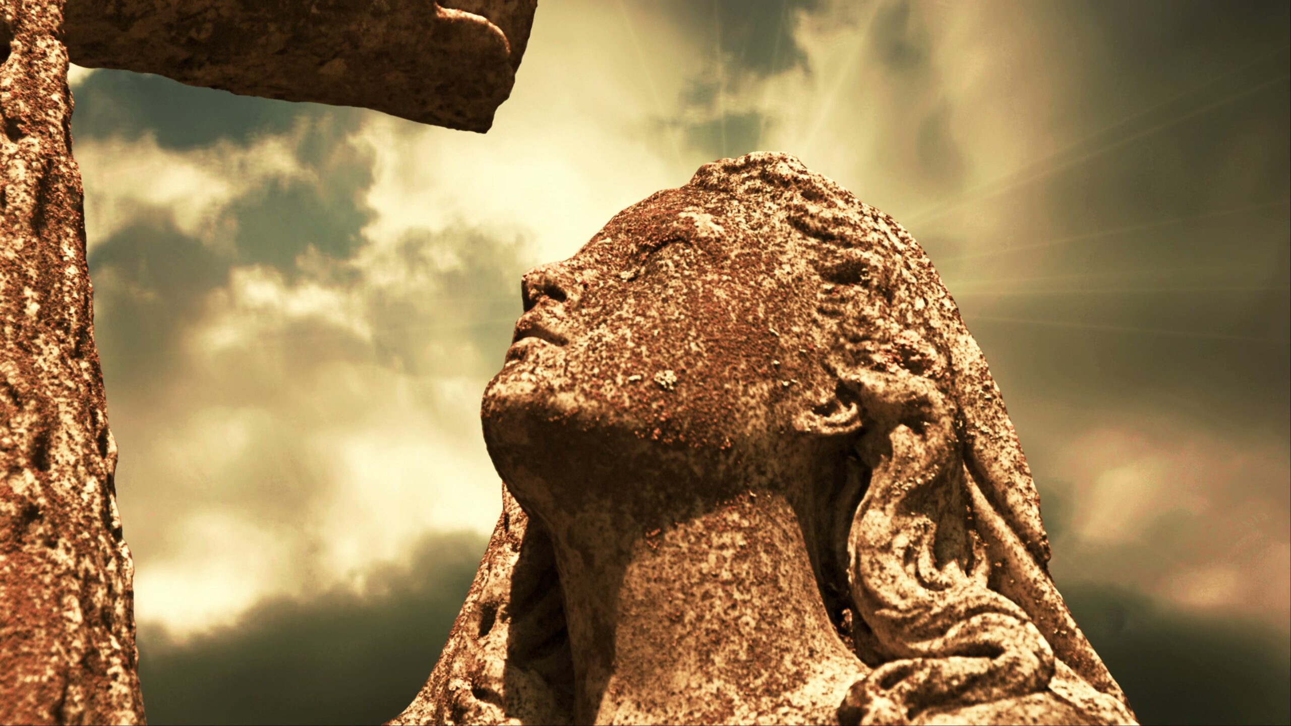 Stone Statue Gazes Towards Sky 4K Loop