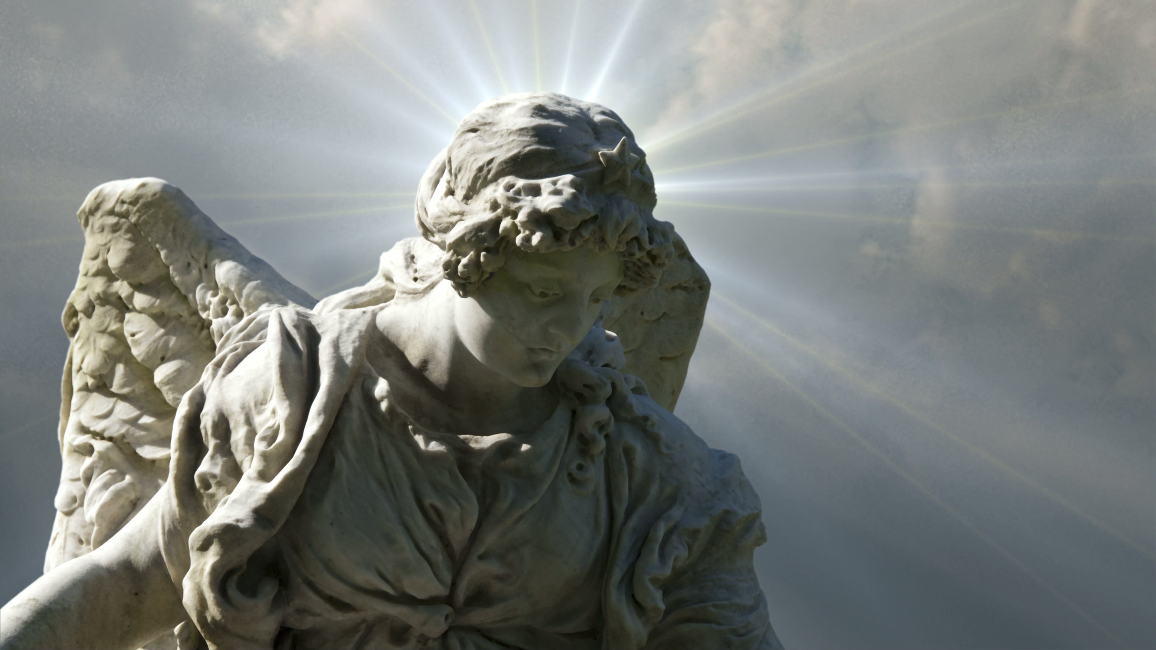 Heavenly Statue Bathed In Light 4K Loop