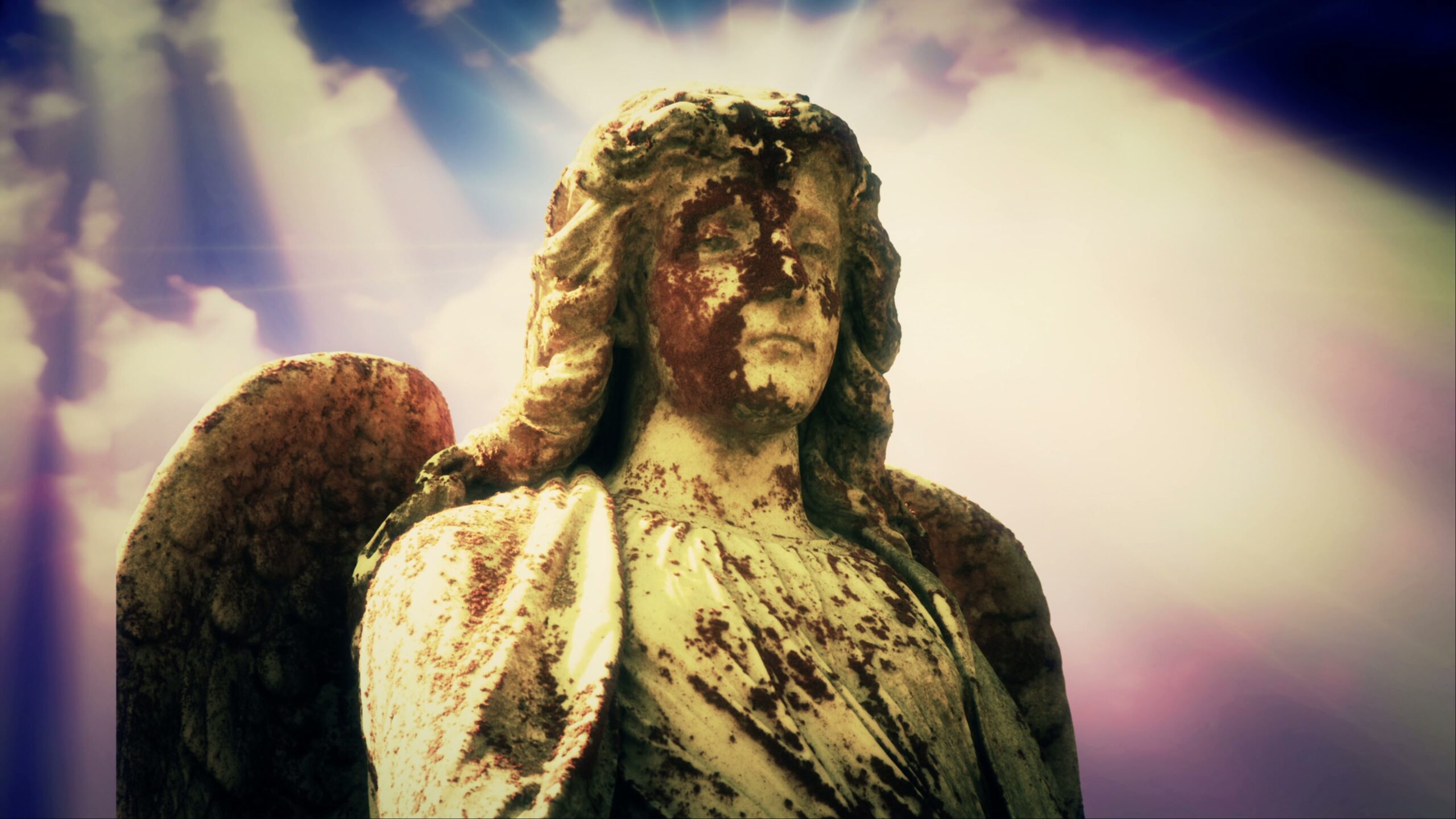 Ancient Angel Statue in Sunlight 4K Video Loop