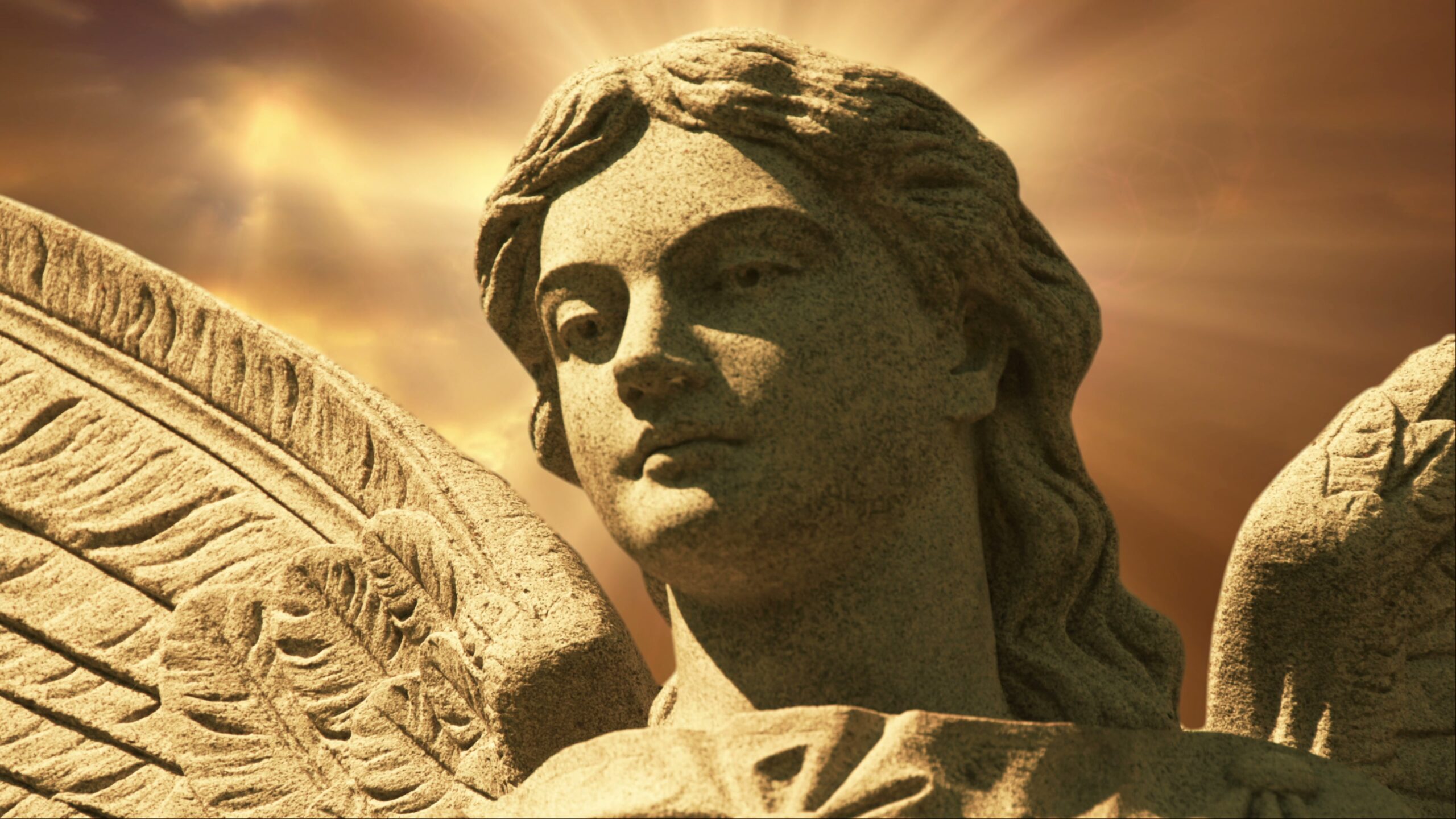 Angel Statue Bathed in Light 4K Loop