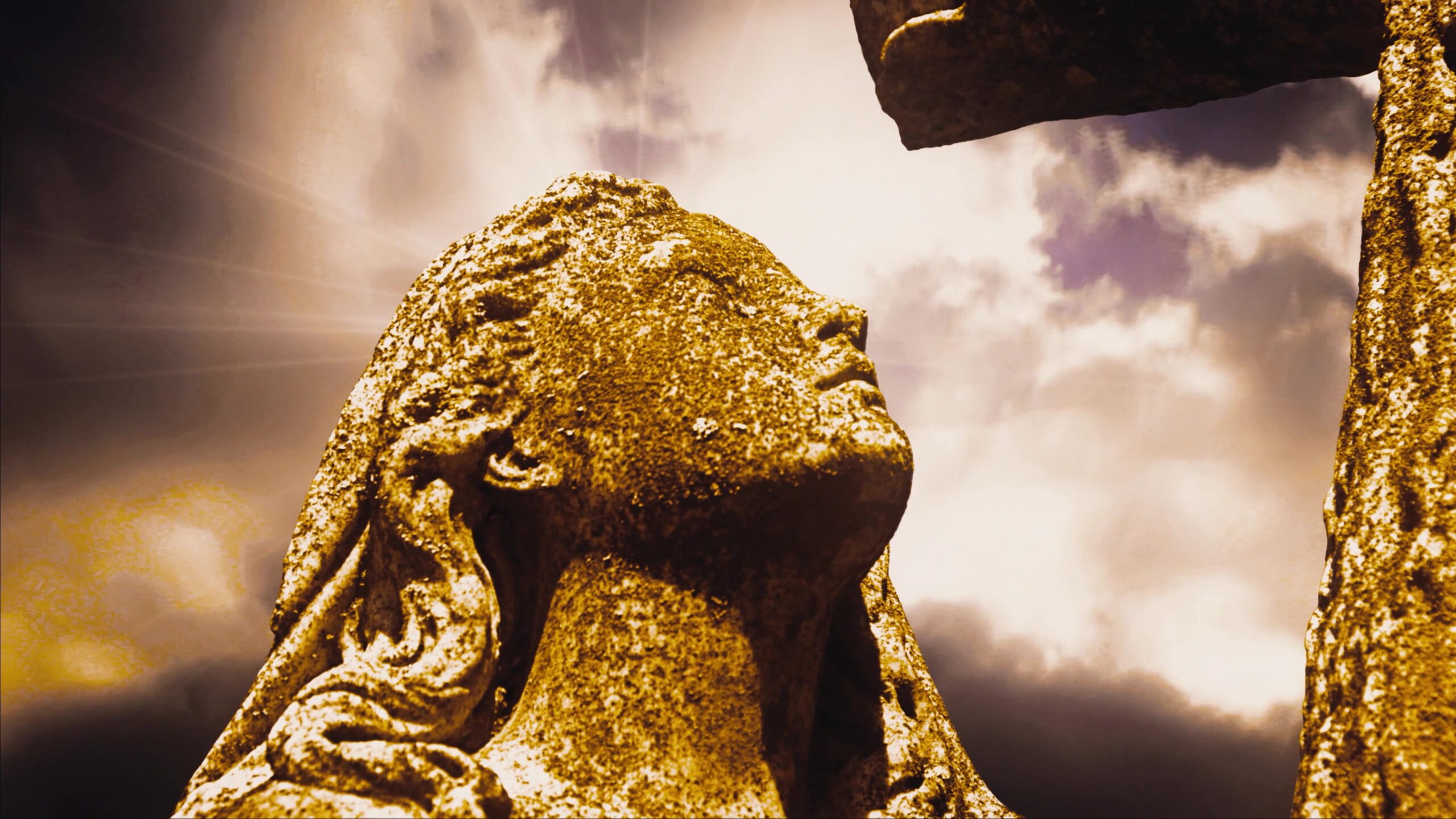 Stone Figure Under Glowing Sky 4K Loop