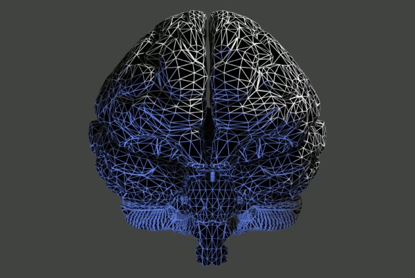 3D wireframe 4K video loop of a human brain with geometric patterns, showing modern technology and digital sophistication against a dark gray background.