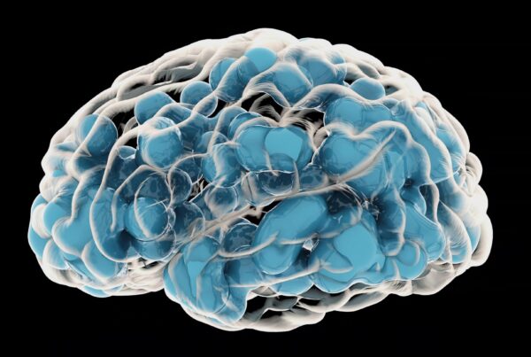 Artistic 4K video rendering of a human brain with blue hemispheres and intricate design against a black background.