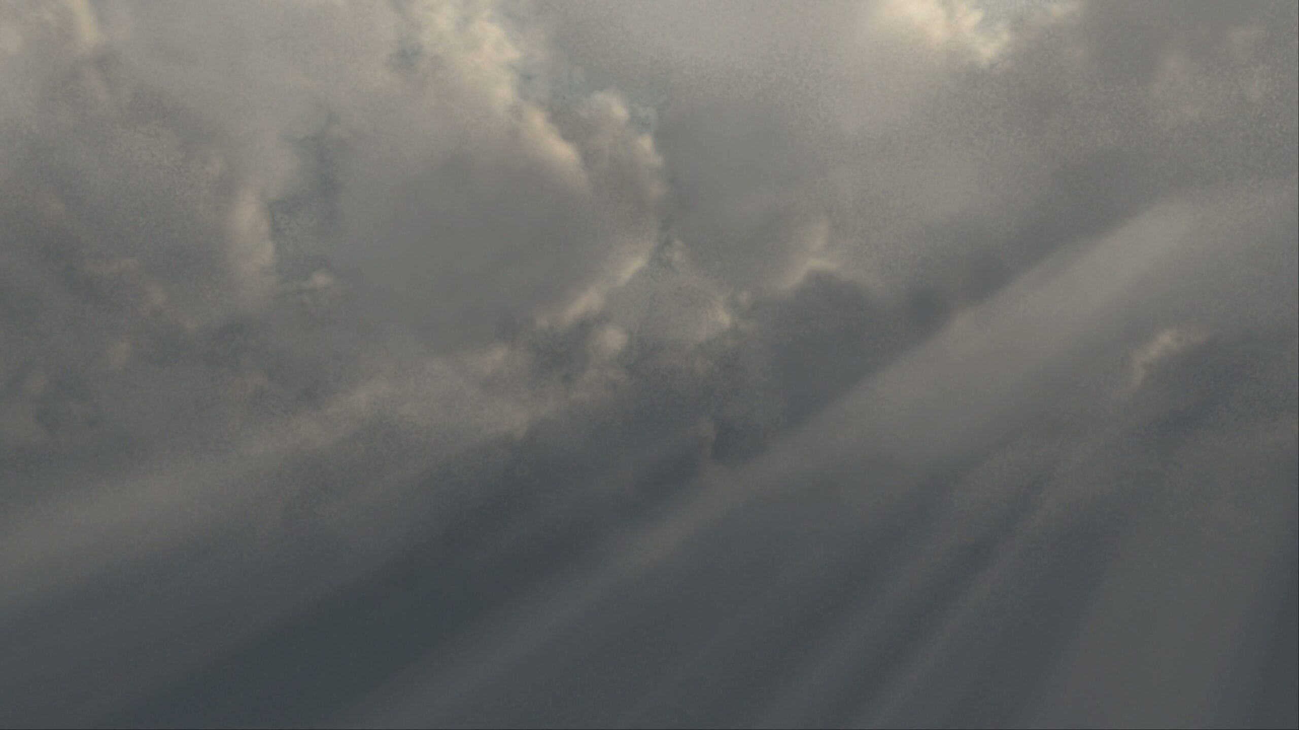 Sunlight Breaking Through Clouds 4K Loop