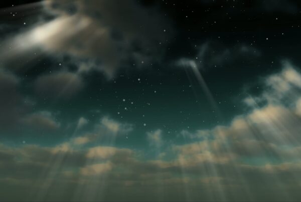 A magical night sky with stars and clouds, illuminated by beams of light.