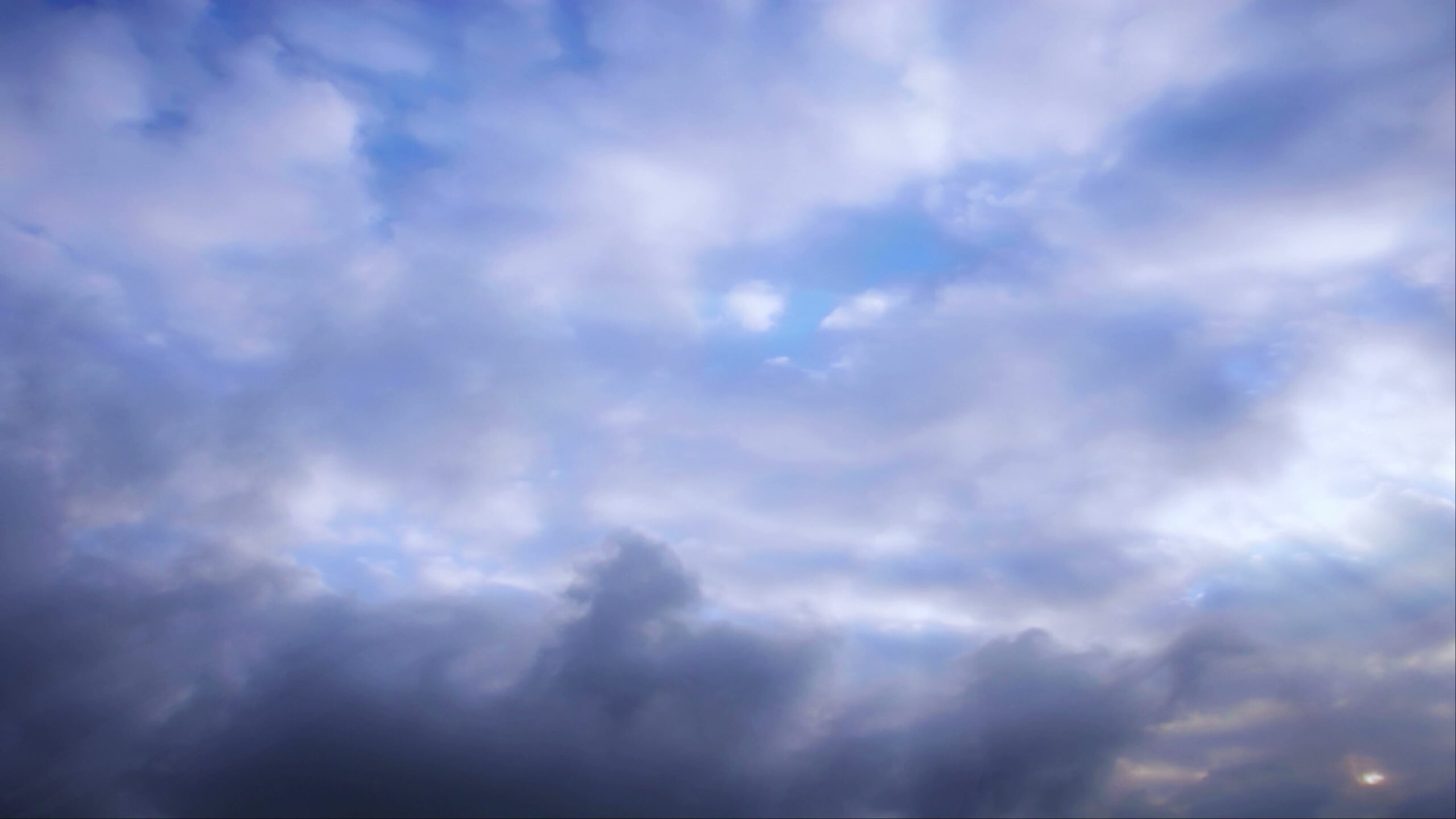 Stormy Time-Lapse Clouds in Blue Sky 4K Loop