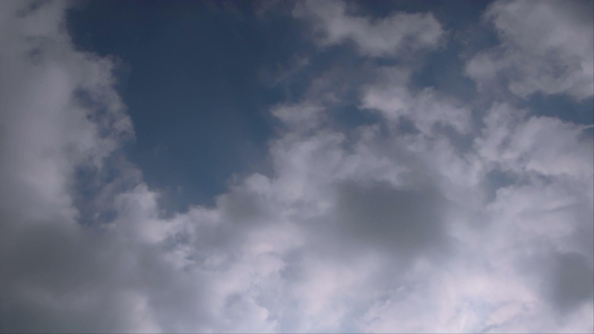 Wispy Time-Lapse Clouds in Blue Sky