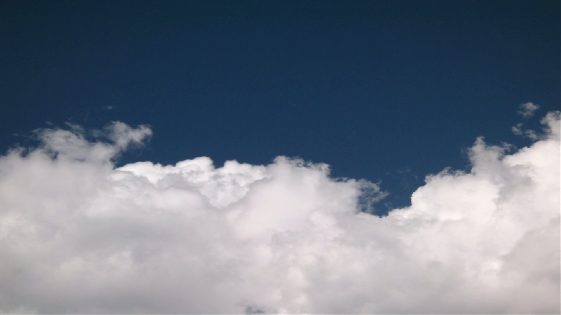 Serene Skies with Cotton Time-Lapse Clouds
