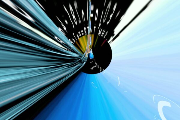 Abstract digital video loop featuring a dynamic blue and black streaming data tunnel animation, creating a sense of motion and futuristic energy with white streaks and circular animated patterns.