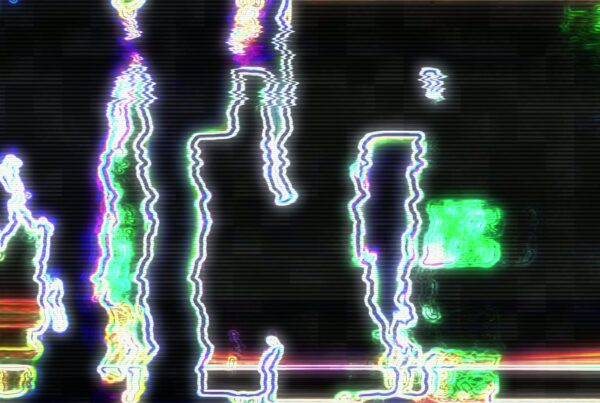 Abstract digital glitch video loop with vivid neon colors and distortion creating a dynamic, futuristic aesthetic.