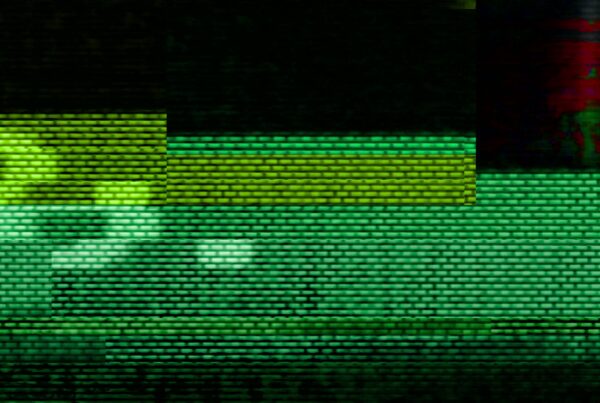 4K video loop of abstract glitch art with green, yellow, and red pixelated lines creating a digital distortion effect.