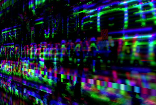 Vibrant digital glitch art 4K video loop with neon colors and distorted patterns.
