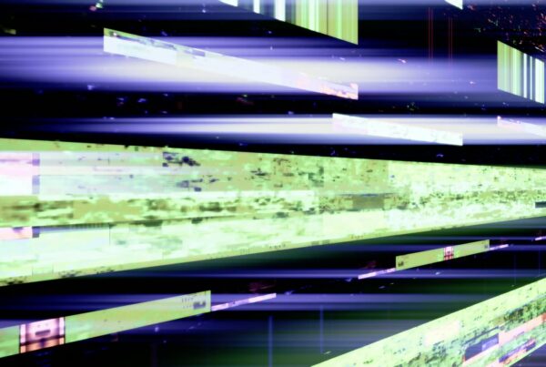 Abstract digital video loop with colorful horizontal streaks, depicting a glitch effect with shades of green and purple.