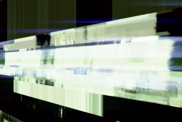Abstract digital glitch art looping video with green, white, and black horizontal bands creating a dynamic, futuristic aesthetic.