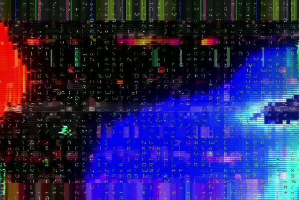 Vivid digital glitch art video loop featuring pixelated distortions with bright hues of red, green, and blue, interspersed with alphanumeric symbols creating a chaotic yet captivating abstract video.