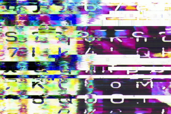 Abstract 4k video loop of digital glitch art with vibrant colors, distorted letters, and numbers creating a chaotic yet captivating visual.