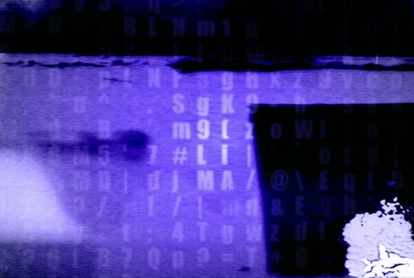 Abstract digital video loop with blue and purple hues, featuring zooming numbers and letters with a glitch-like appearance.
