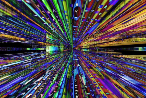 Vibrant abstract looping video of multicolored light trails converging at a central point, creating a dynamic and futuristic visual experience.
