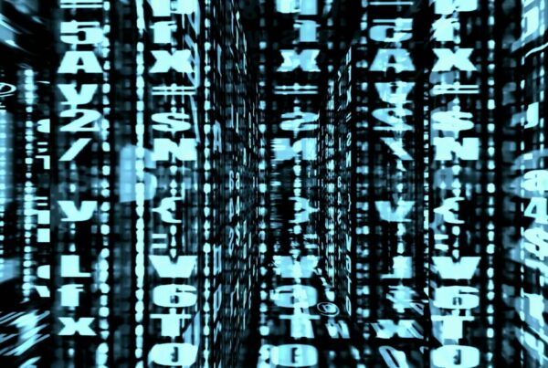 An abstract video loop of cascading blue alphanumeric characters creating a digital data matrix.