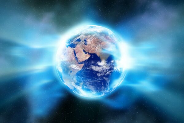 A breathtaking video loop animation of Earth from space, enveloped in a glowing blue light against a backdrop of the starry cosmos.