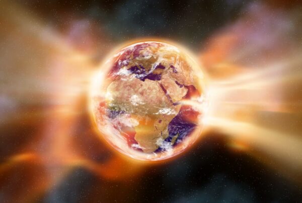 A vibrant 3D animation of Earth, glowing in reds and oranges, surrounded by cosmic flares and stars, illustrating the planet's global warming problem.