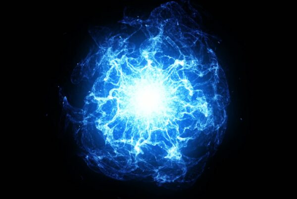 A glowing blue energy sphere with dynamic tendrils radiating from a bright center, set against a black background, creating a mystical and cosmic video loop.