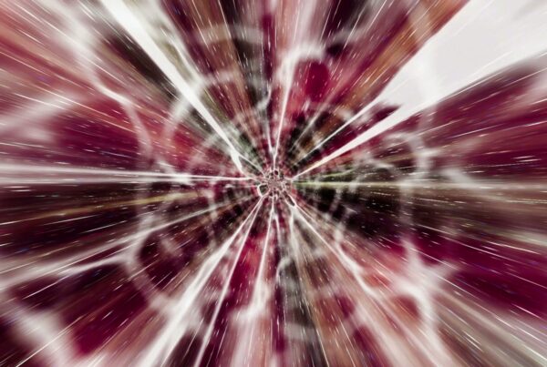 Abstract video loop depicting a dynamic cosmic tunnel burst with vibrant streaks of white, red, and purple radiating from a central point, creating a three-dimensional, energetic explosion effect.