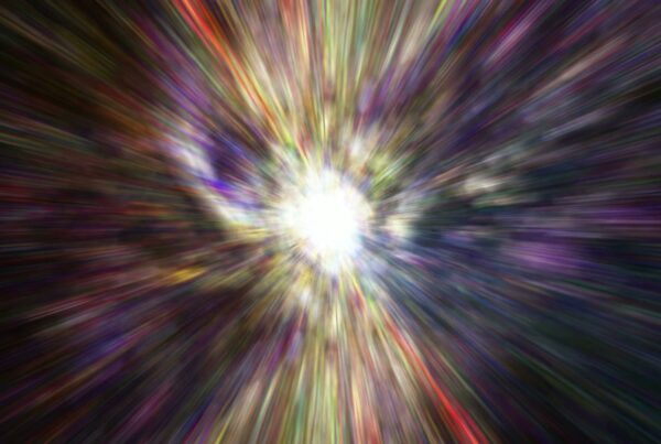 A vibrant video loop explosion of colors radiating from a central bright core, resembling cosmic phenomena.