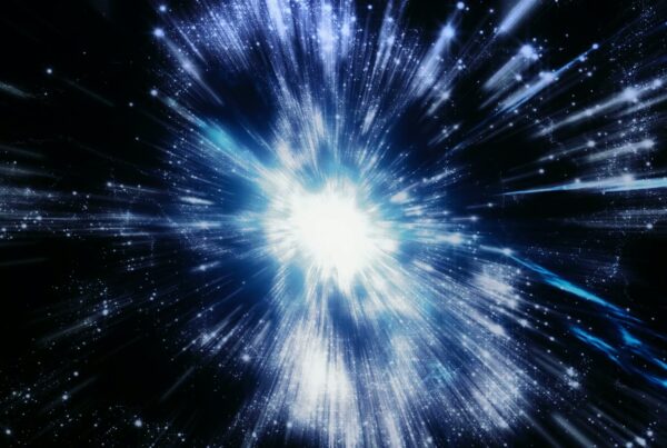 A stunning animation of a cosmic explosion of radiant light with bright white and blue rays emanating from a core, surrounded by specks representing stars or galaxies in the vastness of outer space.