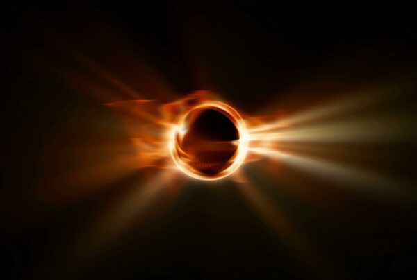 4K video loop of a solar eclipse with a radiant, glowing corona emitting vibrant beams in the darkness.