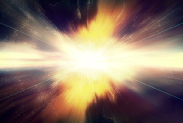 A vivid 4K video loop depiction of a cosmic explosion with bright light radiating outward, surrounded by dark space and speckled with stars.