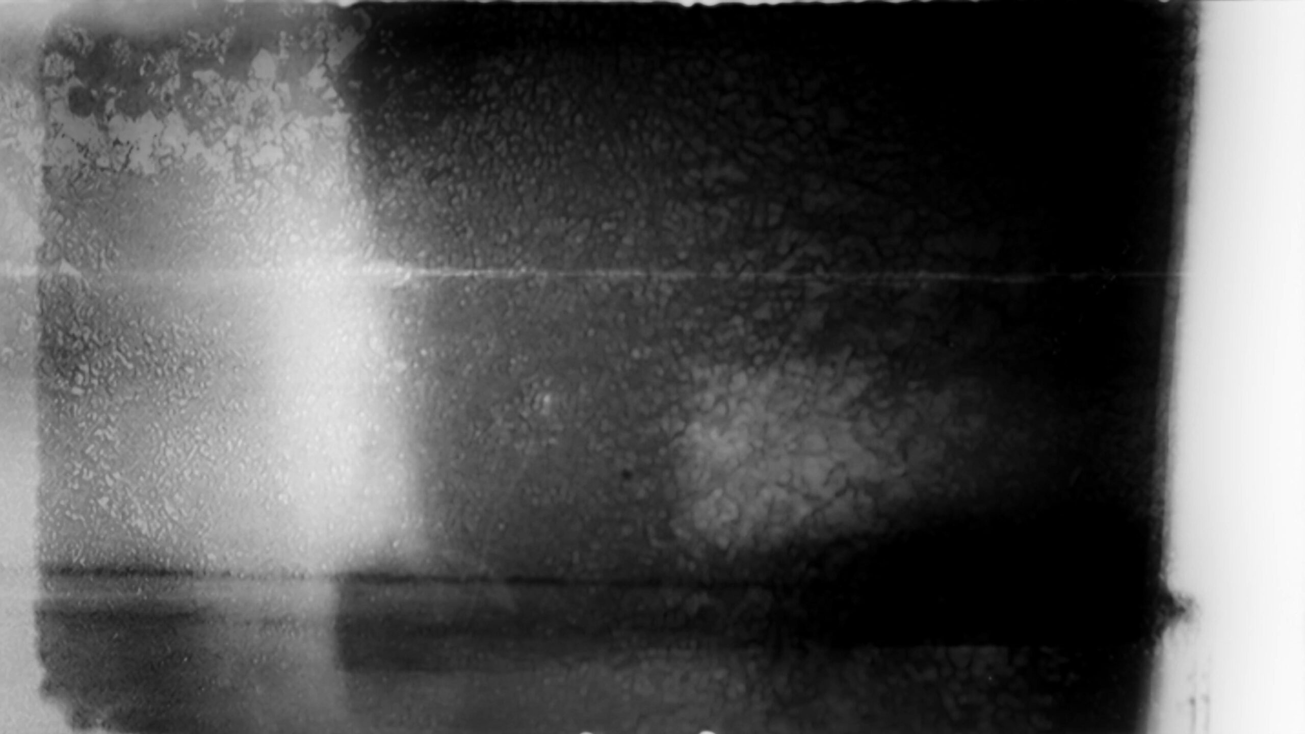 Grainy 16mm Cinematic Texture 4K Video Loop