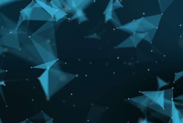 Abstract video loop of a geometric digital network with blue triangular shapes and white dots on a dark background, representing connectivity and technology.