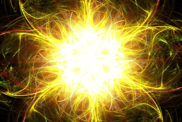 A captivating digital video loop showcasing an explosive burst of bright yellow and white energy, surrounded by swirling patterns of green and red against a dark background.