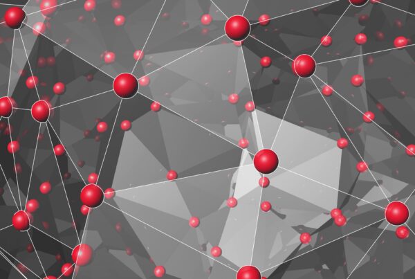 Digital abstract 4K video loop featuring interconnected red spheres on a geometric background, illustrating network connectivity and modern design principles.