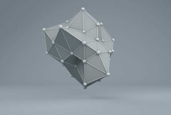 Abstract 3D geometric structure with interconnected triangular panels and spherical nodes floating against a gradient gray background, showcasing modern and minimalist design elements in a video loop.