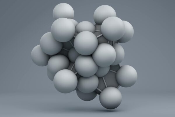 4K video loop shows a 3D model of interconnected gray spheres representing a molecular structure on a gradient gray background.