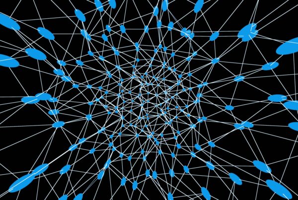 A complex network of interconnected blue nodes moving on a black background, illustrating data or communication structures.
