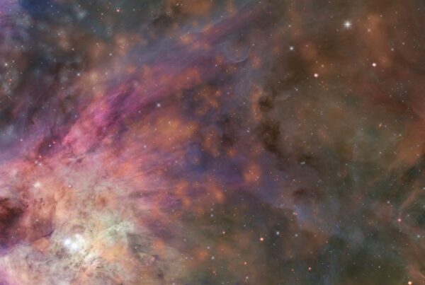 A 4K video of a celestial nebula with colorful, swirling gas and bright stars.