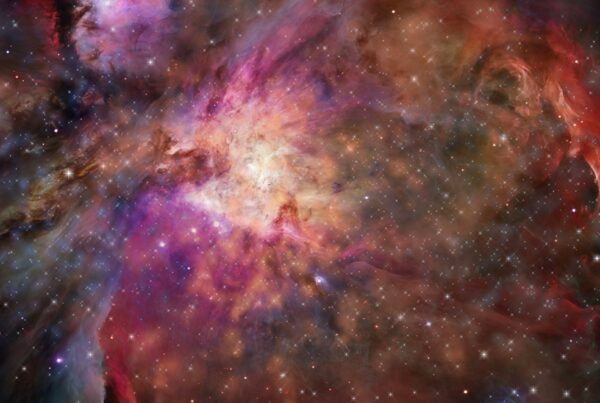 Stunning 4K video of a vibrant cosmic nebula with bright stars and colorful interstellar clouds.