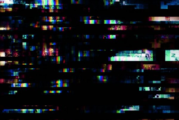 Abstract digital glitch looping video showcasing colorful horizontal bands of pixelated noise against a black background, creating a striking visual of digital imperfection.