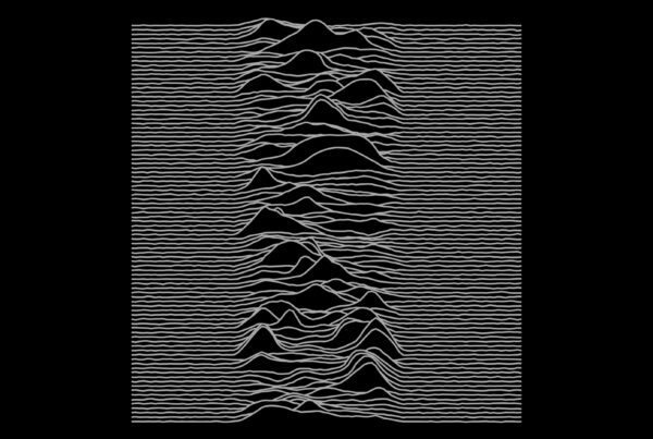 4K looping video of a monochrome sound wave pattern design on black background.