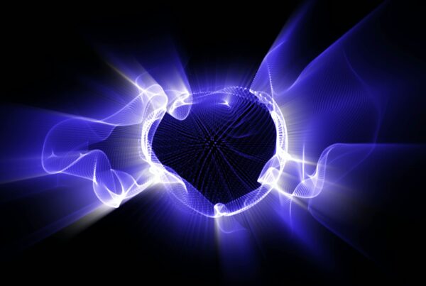 Abstract 4K video loop of vibrant blue and purple energy waves forming circular patterns with dynamic motion on a dark background.