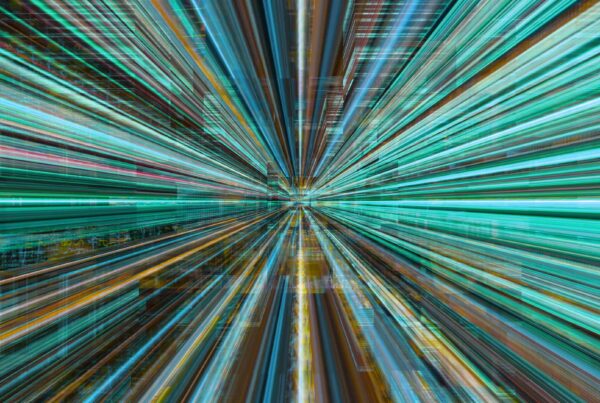 A 4K looping dynamic digital art video depicting vibrant light streaks in a futuristic cityscapes, creating a sense of high-speed and innovation.