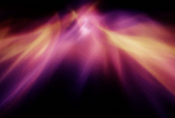 Abstract video loop featuring swirling shades of purple, pink, and yellow on a dark background, creating a dynamic and vibrant visual effect with depth and texture.