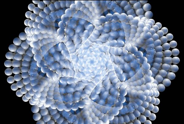 Abstract 4K video loop of blue spheres arranged in a symmetrical, flower-like spiral with a black background.