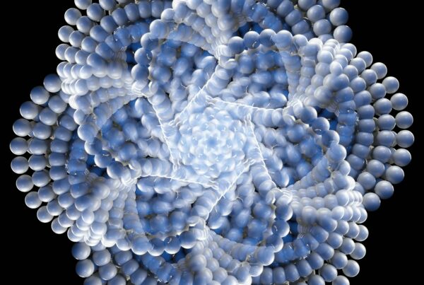 The flower of life sacred geometry structure made of blue and white spheres on a black background.